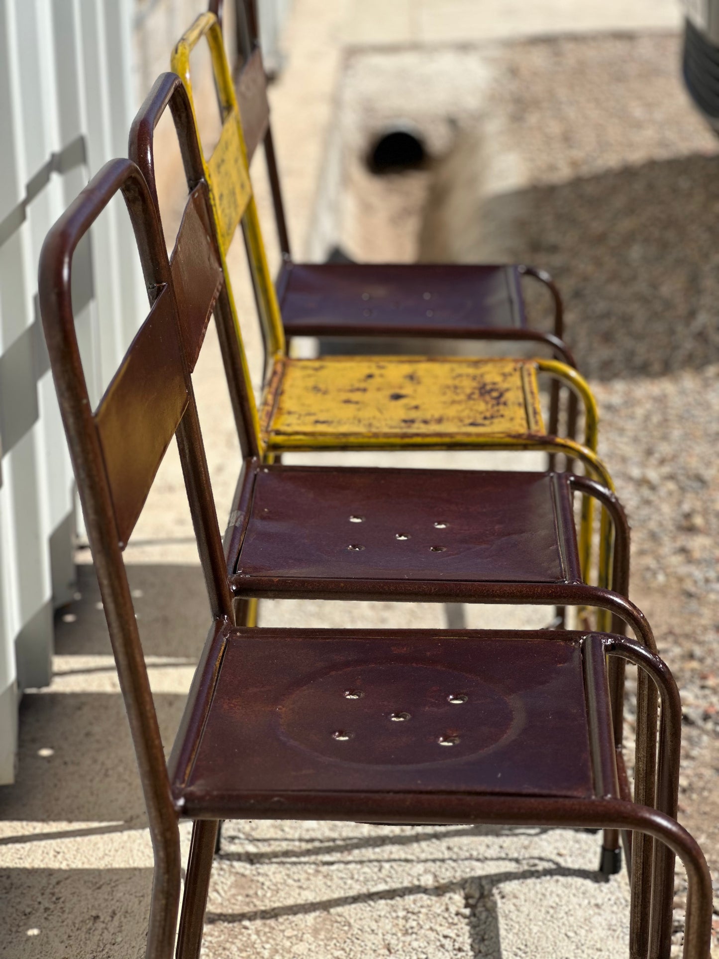 4 chaises d'atelier vintage en métal