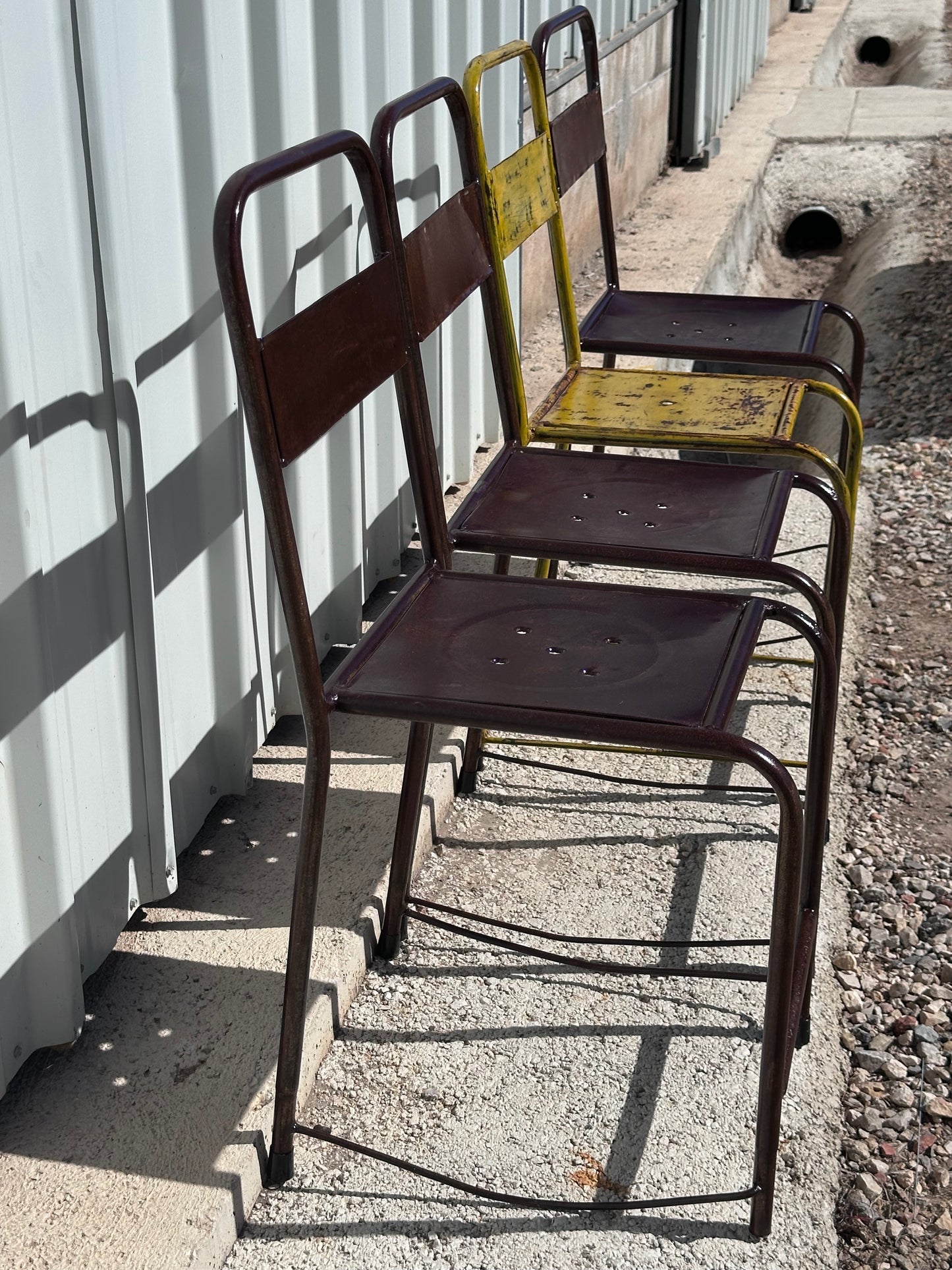4 chaises d'atelier vintage en métal