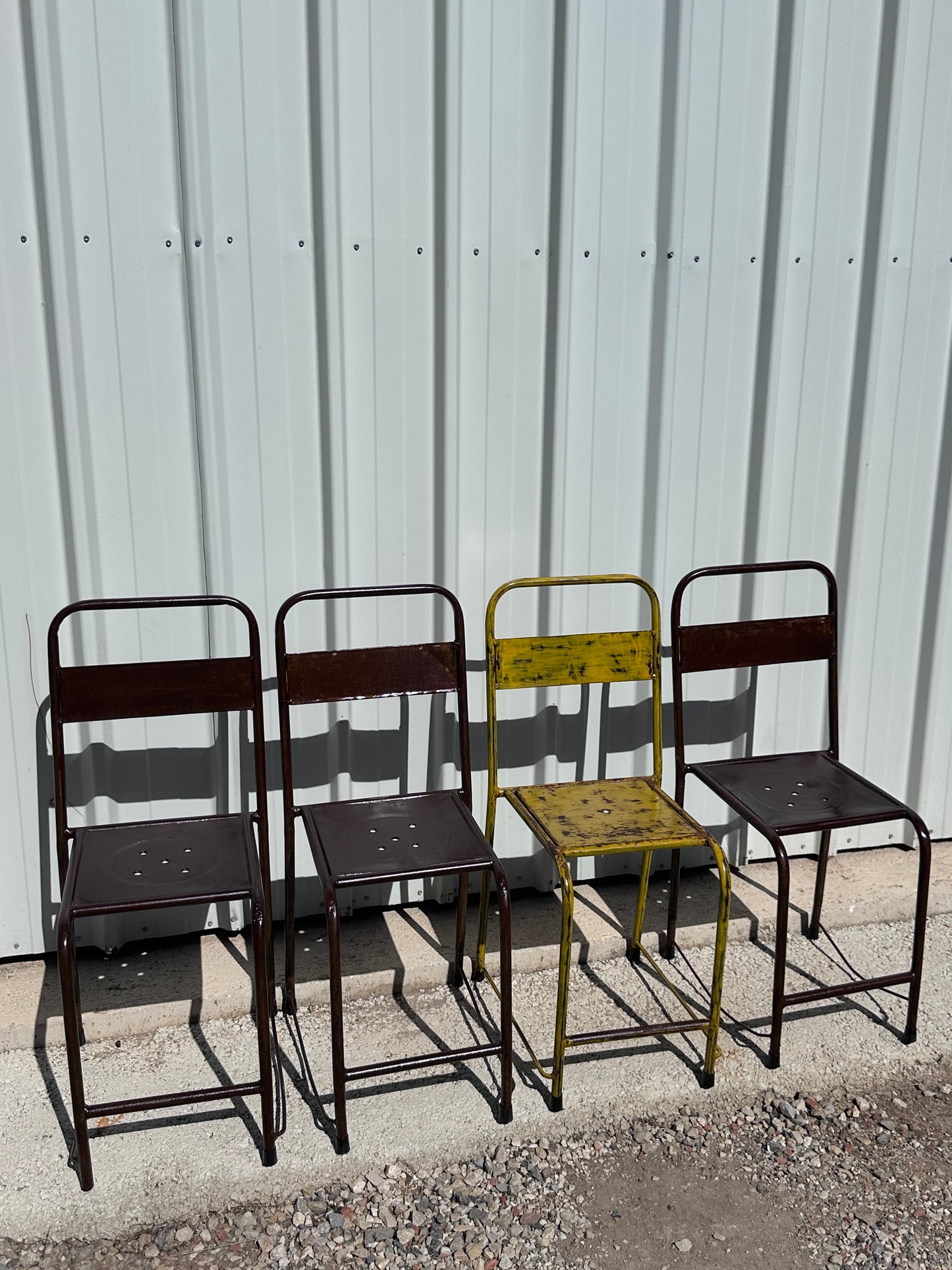 4 chaises d'atelier vintage en métal