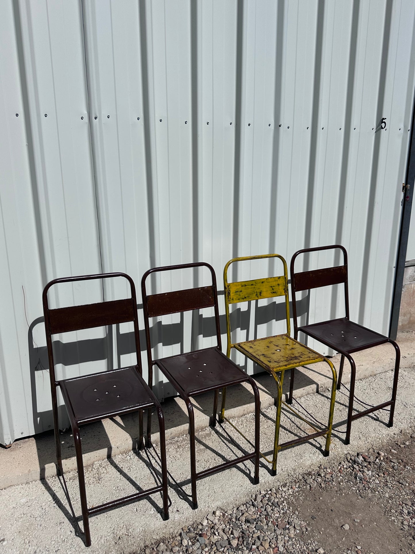 4 chaises d'atelier vintage en métal