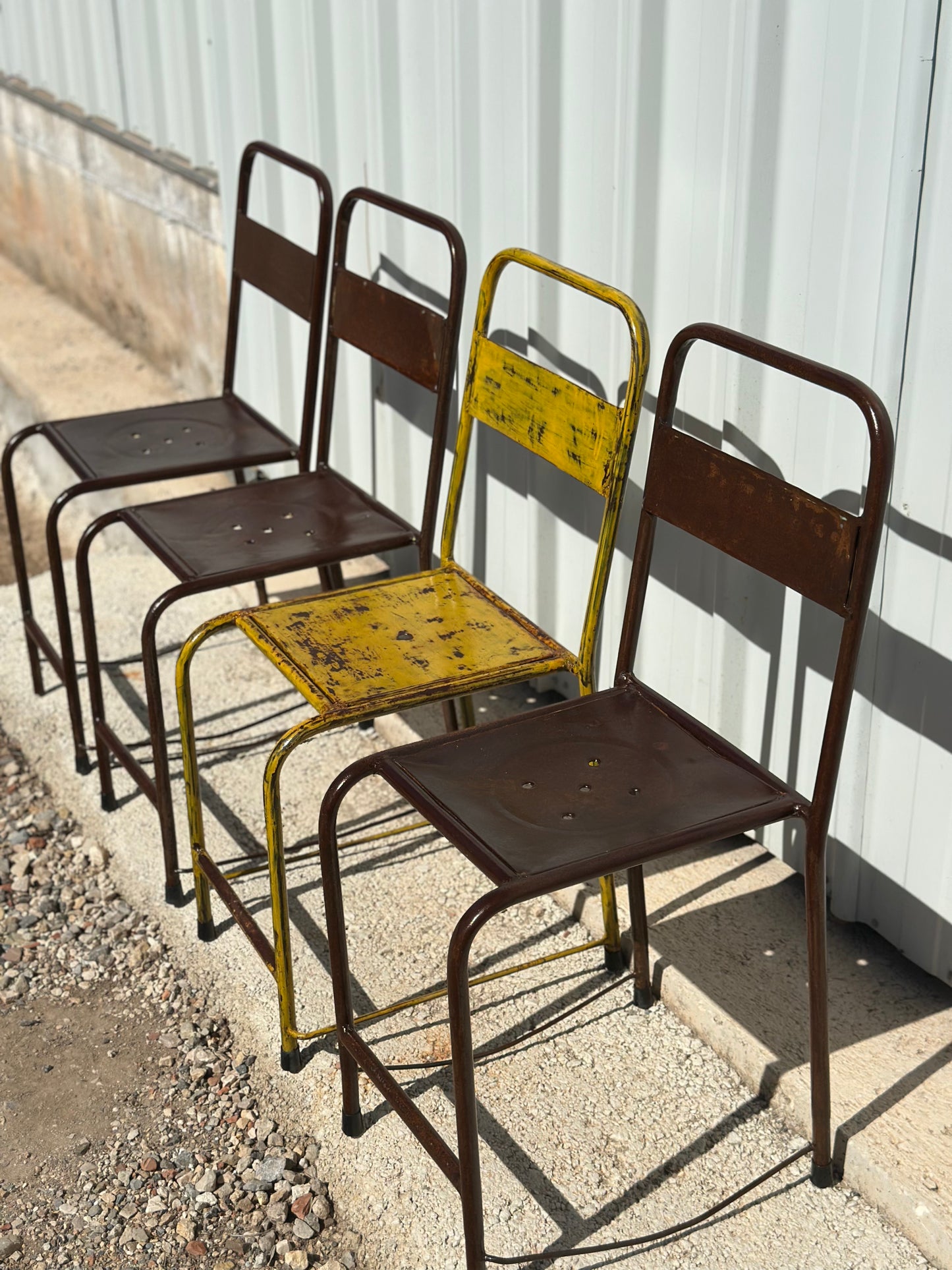 4 chaises d'atelier vintage en métal