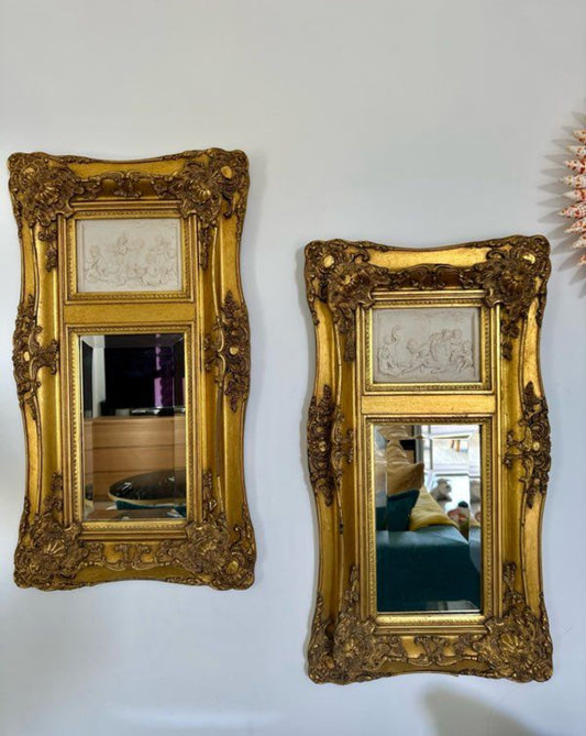 Paire de miroirs biseautés trumeaux