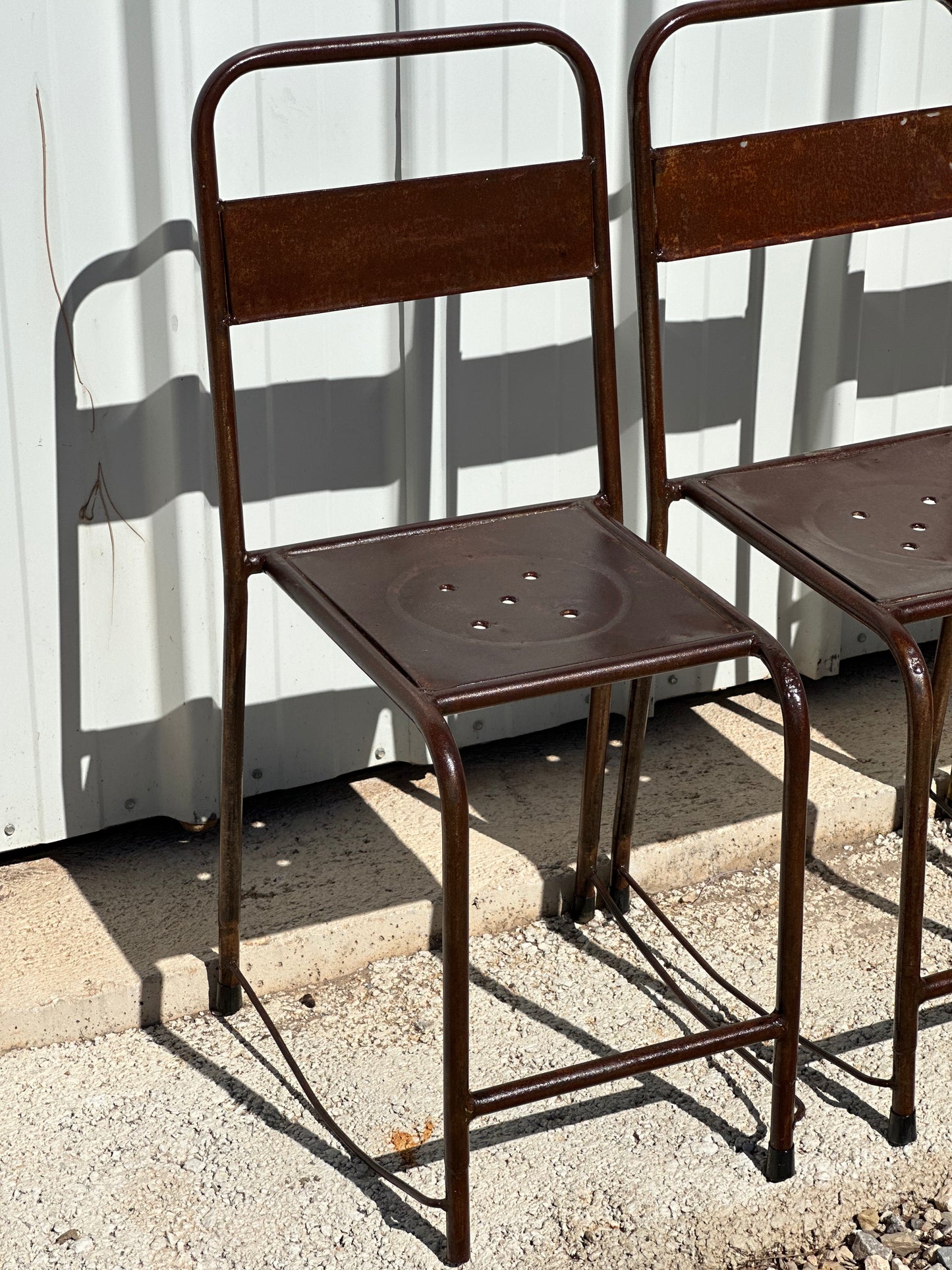 4 chaises d'atelier vintage en métal