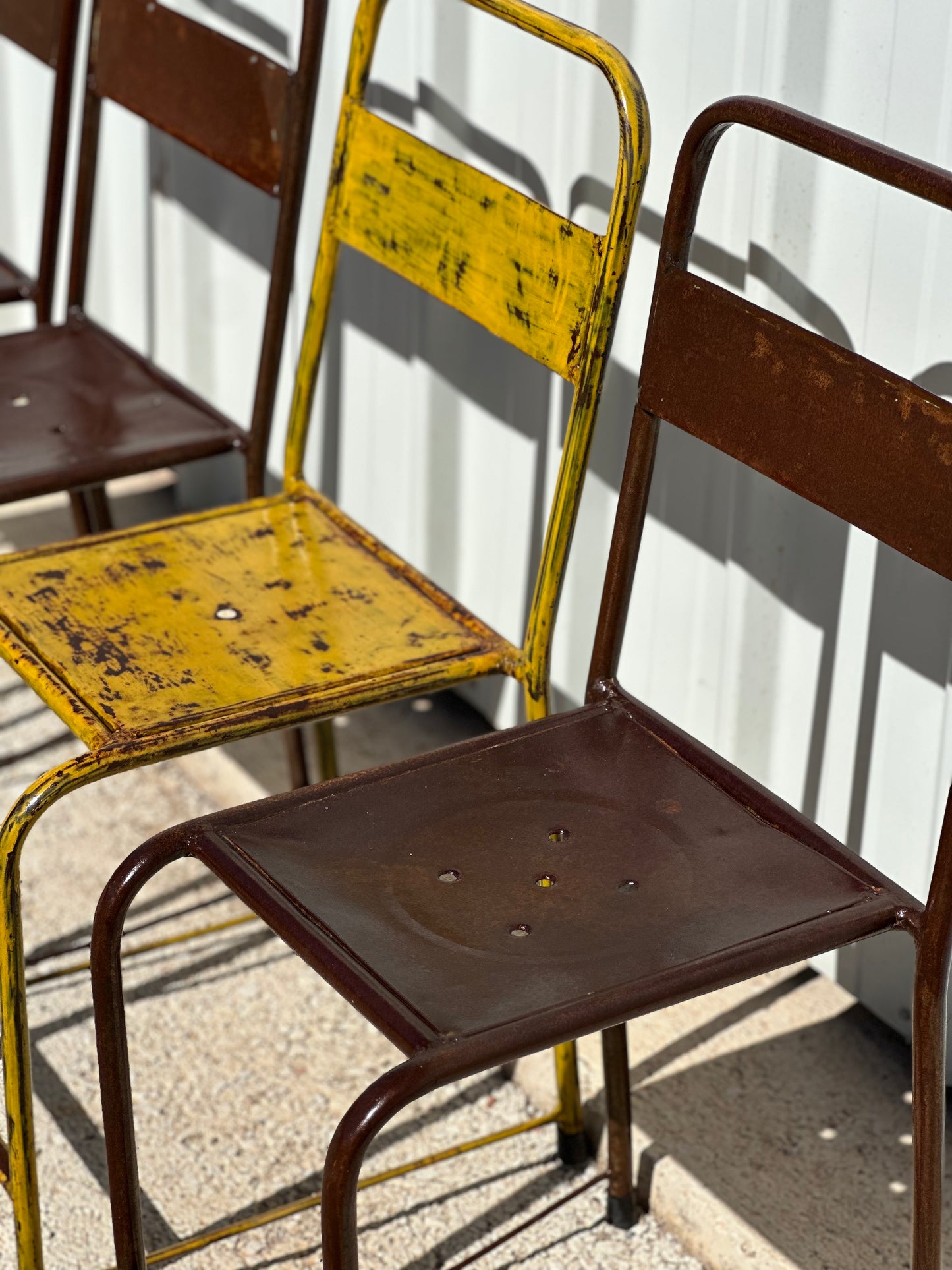 4 chaises d'atelier vintage en métal